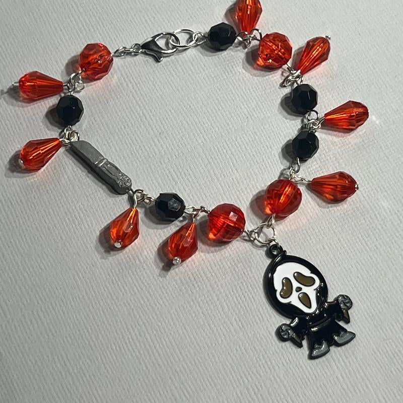 Scream Inspired Charm Bracelet Featuring Figure and Knife Charm