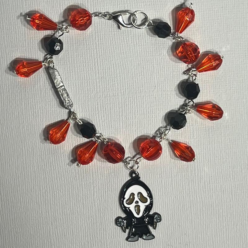 Scream Inspired Charm Bracelet Featuring Figure and Knife Charm