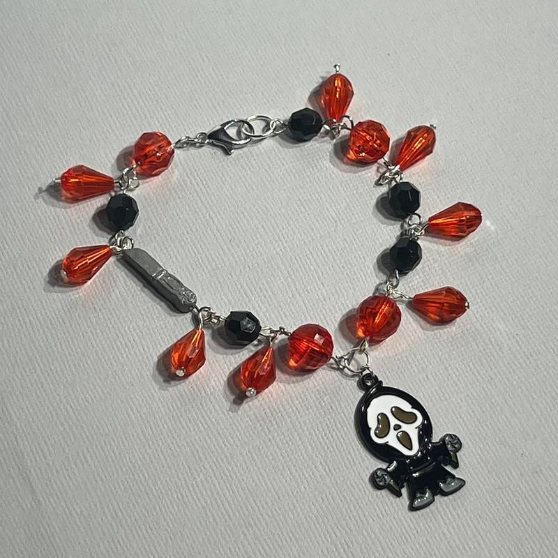 Scream Inspired Charm Bracelet Featuring Figure and Knife Charm